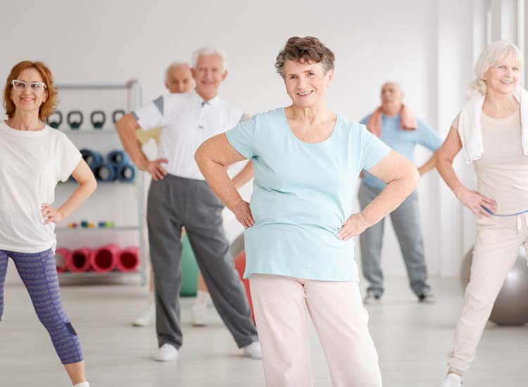 Group,Of,Active,Seniors,Exercising,In,Fitness,Club
